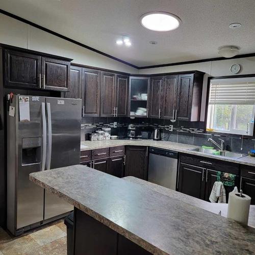 22006 Township Road 820, Rural Northern Sunrise County, AB - Indoor Photo Showing Kitchen With Double Sink