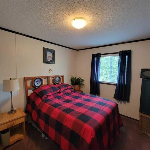 22006 Township Road 820, Rural Northern Sunrise County, AB - Indoor Photo Showing Bedroom