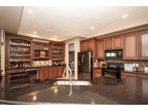 2-714040 Range Road 71, Grande Prairie, AB - Indoor Photo Showing Kitchen With Double Sink