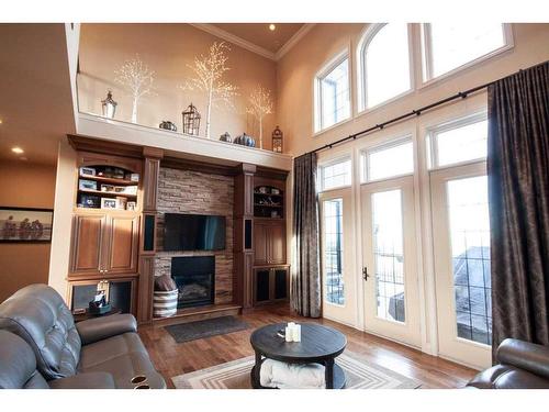 2-714040 Range Road 71, Grande Prairie, AB - Indoor Photo Showing Living Room With Fireplace