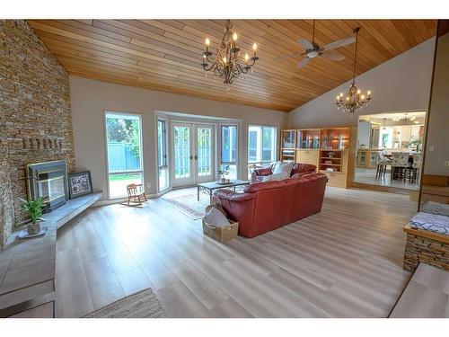 6101 96A Street, Grande Prairie, AB - Indoor Photo Showing Living Room With Fireplace