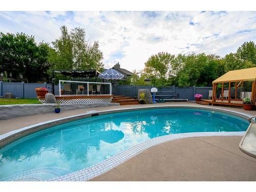 6101 96A Street, Grande Prairie, AB - Outdoor With In Ground Pool With Deck Patio Veranda With Backyard