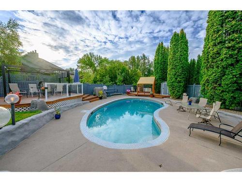 6101 96A Street, Grande Prairie, AB - Outdoor With In Ground Pool With Deck Patio Veranda