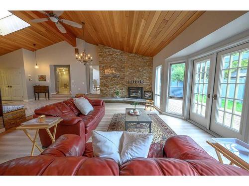 6101 96A Street, Grande Prairie, AB - Indoor Photo Showing Living Room With Fireplace