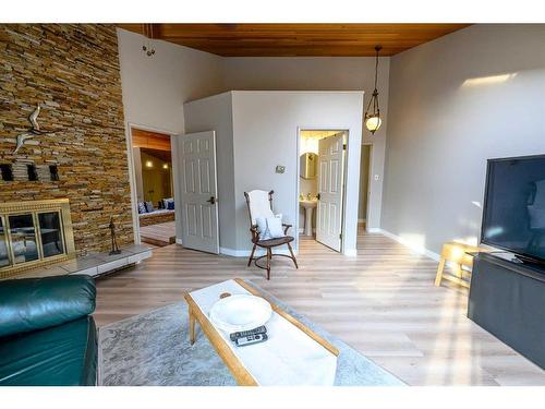 6101 96A Street, Grande Prairie, AB - Indoor Photo Showing Living Room With Fireplace