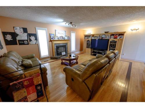 710049 71 Range, Rural Grande Prairie No. 1, County Of, AB - Indoor Photo Showing Living Room With Fireplace