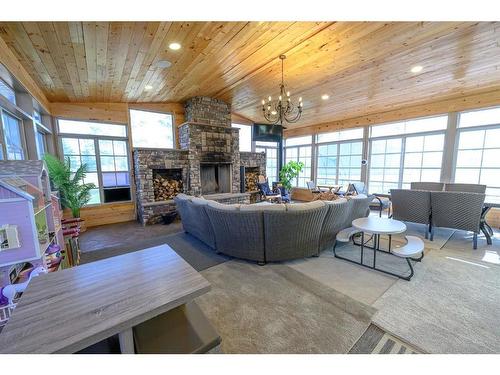 710049 71 Range, Rural Grande Prairie No. 1, County Of, AB - Indoor Photo Showing Living Room With Fireplace