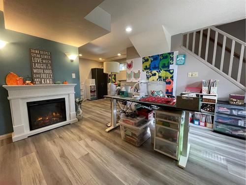 5009 45Th Street, High Prairie, AB - Indoor Photo Showing Living Room With Fireplace