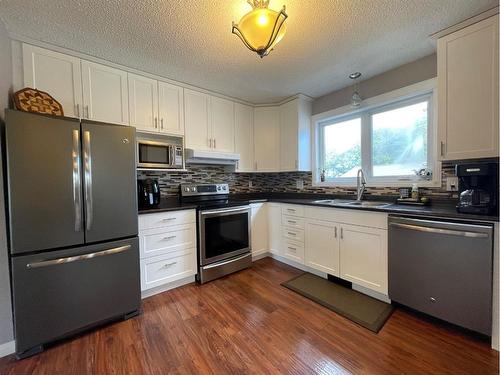 5009 45Th Street, High Prairie, AB - Indoor Photo Showing Kitchen With Double Sink