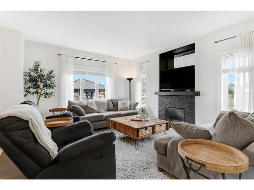 8565 72 Avenue, Grande Prairie, AB - Indoor Photo Showing Living Room With Fireplace