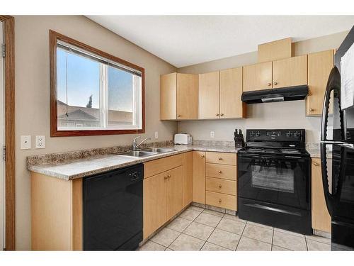 101-105, 201-205, 301-305-9225 93 Avenue, Grande Prairie, AB - Indoor Photo Showing Kitchen With Double Sink