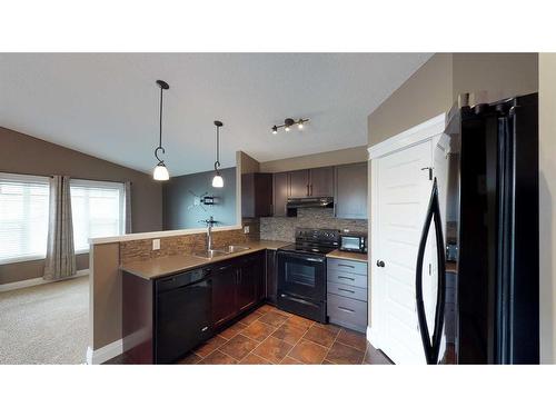 9302 100 Avenue, Grande Prairie, AB - Indoor Photo Showing Kitchen