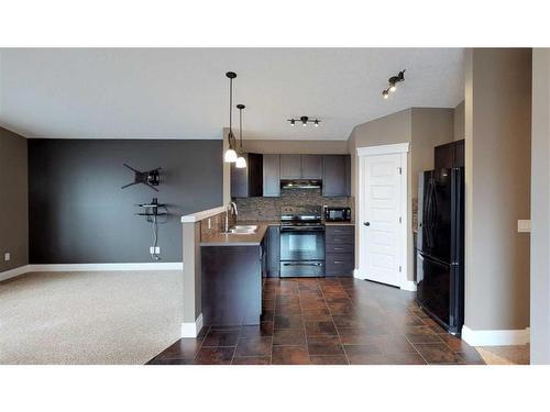 9302 100 Avenue, Grande Prairie, AB - Indoor Photo Showing Kitchen With Upgraded Kitchen