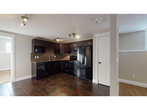 9302 100 Avenue, Grande Prairie, AB - Indoor Photo Showing Kitchen