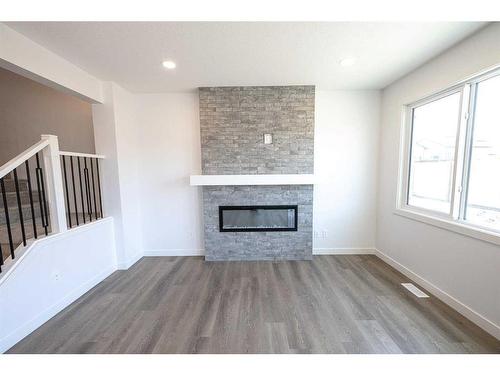 12834 87A Street, Grande Prairie, AB - Indoor Photo Showing Living Room With Fireplace