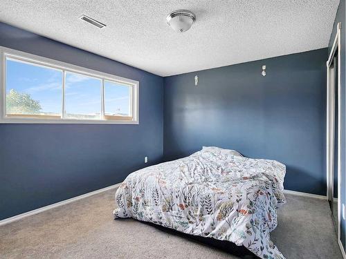 11083 Swann Drive, Grande Cache, AB - Indoor Photo Showing Bedroom