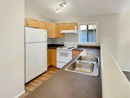 11250 74 Avenue, Grande Prairie, AB - Indoor Photo Showing Kitchen With Double Sink