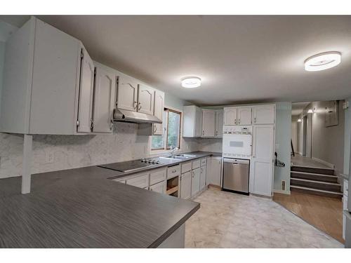 4801 49 Ave, Grimshaw, AB - Indoor Photo Showing Kitchen With Double Sink