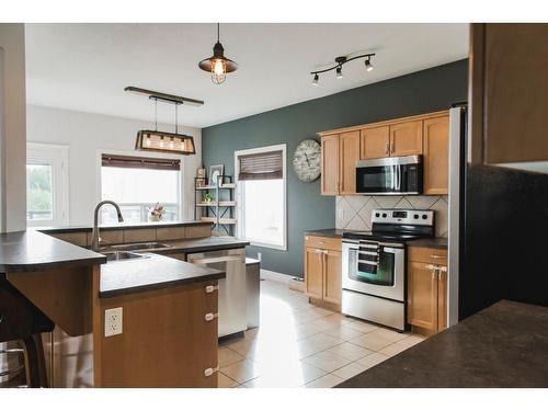 8605 70 Avenue, Grande Prairie, AB - Indoor Photo Showing Kitchen With Double Sink