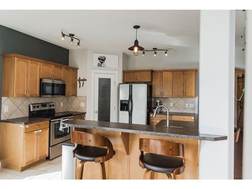 8605 70 Avenue, Grande Prairie, AB - Indoor Photo Showing Kitchen With Double Sink