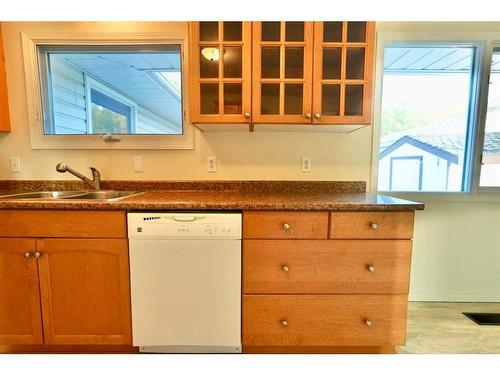 10812 103A Street, Peace River, AB - Indoor Photo Showing Kitchen With Double Sink