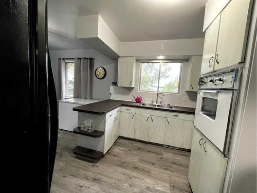 10266 111 Avenue, Grande Prairie, AB - Indoor Photo Showing Kitchen With Double Sink