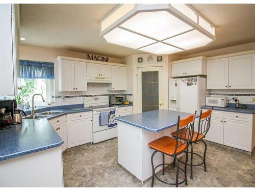 7509 102 Street, Grande Prairie, AB - Indoor Photo Showing Kitchen With Double Sink