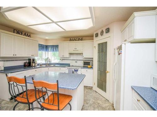 7509 102 Street, Grande Prairie, AB - Indoor Photo Showing Kitchen With Double Sink