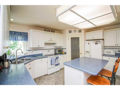 7509 102 Street, Grande Prairie, AB - Indoor Photo Showing Kitchen With Double Sink