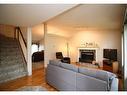 7509 102 Street, Grande Prairie, AB  - Indoor Photo Showing Living Room With Fireplace 