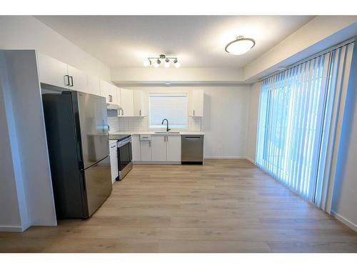 10101 105 Avenue, Grande Prairie, AB - Indoor Photo Showing Kitchen