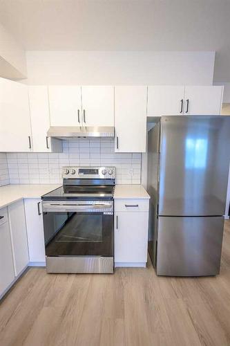 10101 105 Avenue, Grande Prairie, AB - Indoor Photo Showing Kitchen With Stainless Steel Kitchen