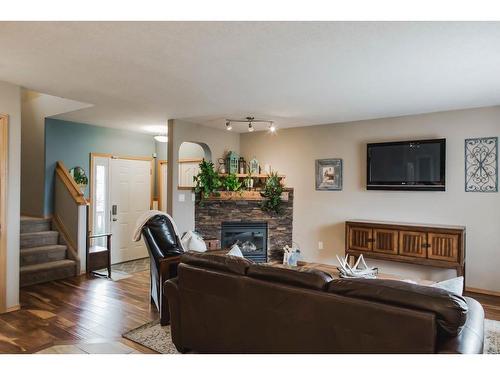 9502 91 Street, Grande Prairie, AB - Indoor Photo Showing Living Room With Fireplace