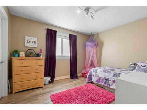 9705 66 Avenue, Grande Prairie, AB - Indoor Photo Showing Bedroom