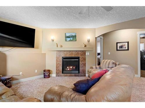 9705 66 Avenue, Grande Prairie, AB - Indoor Photo Showing Living Room With Fireplace