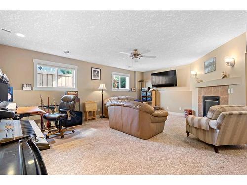 9705 66 Avenue, Grande Prairie, AB - Indoor Photo Showing Living Room With Fireplace