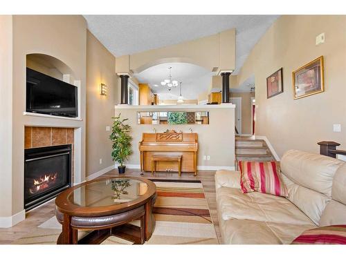 9705 66 Avenue, Grande Prairie, AB - Indoor Photo Showing Living Room With Fireplace