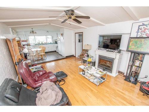 9738 119A Avenue, Grande Prairie, AB - Indoor Photo Showing Living Room With Fireplace