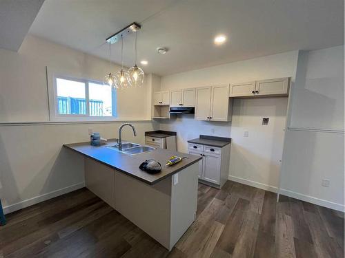 8518 87 Street, Grande Prairie, AB - Indoor Photo Showing Kitchen With Double Sink