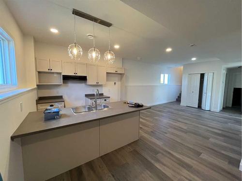 8518 87 Street, Grande Prairie, AB - Indoor Photo Showing Kitchen With Double Sink