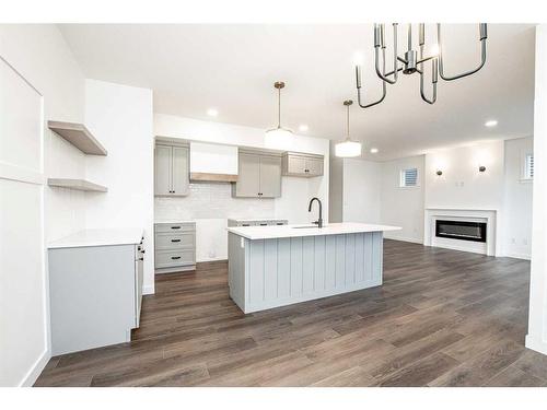 13305 106 Street, Grande Prairie, AB - Indoor Photo Showing Kitchen With Fireplace