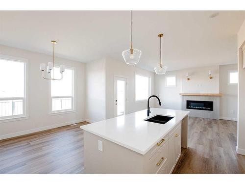 8222 87A Street, Grande Prairie, AB - Indoor Photo Showing Kitchen With Fireplace With Double Sink