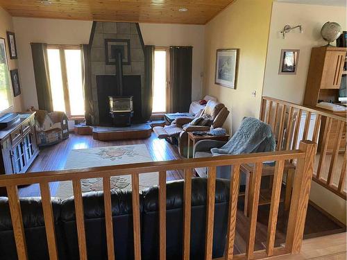 8080 Twp Rd 820, Rural Saddle Hills County, AB - Indoor Photo Showing Living Room With Fireplace