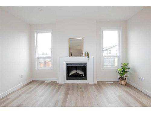 9805 89A Street, Grande Prairie, AB - Indoor Photo Showing Living Room With Fireplace