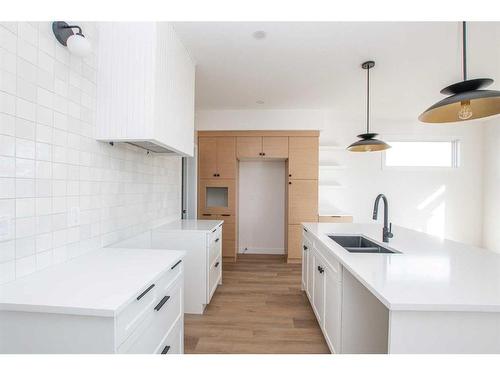 8221 87 Street, Grande Prairie, AB - Indoor Photo Showing Kitchen With Double Sink