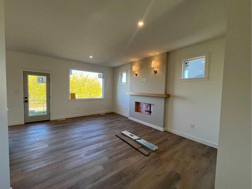 13530 104A Street, Grande Prairie, AB - Indoor Photo Showing Living Room With Fireplace