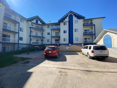 409-10405 99 Avenue, Grande Prairie, AB - Outdoor With Balcony With Facade