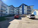 409-10405 99 Avenue, Grande Prairie, AB  - Outdoor With Balcony With Facade 