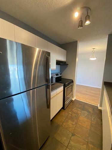 409-10405 99 Avenue, Grande Prairie, AB - Indoor Photo Showing Kitchen