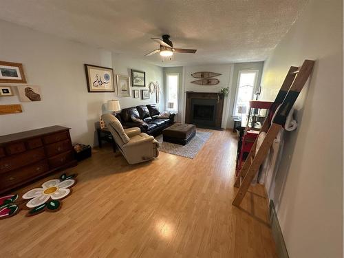 89 843058 Rge Rd 222, Rural Northern Lights, County Of, AB - Indoor Photo Showing Living Room With Fireplace